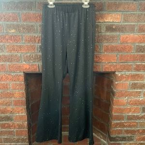 Black and shimmer flare pants size small.